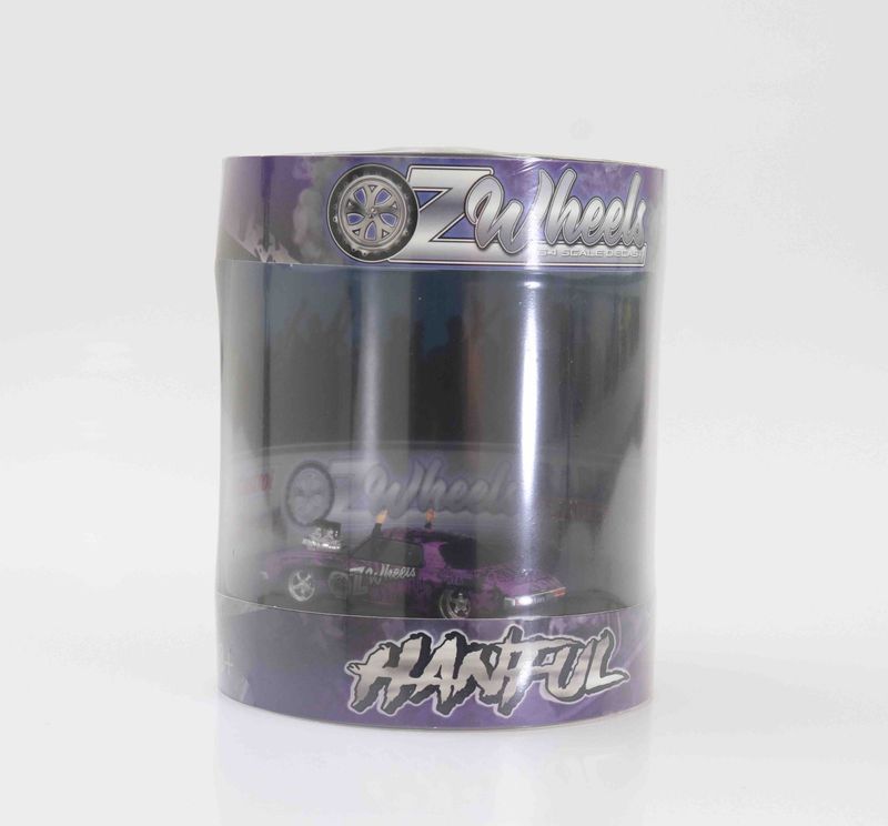 Oz Wheels 1/64 Oz Wheels Hanful Skid in Cylinder Oz Wheels 1/64 Oz Wheels Hanful Skid in Cylinder