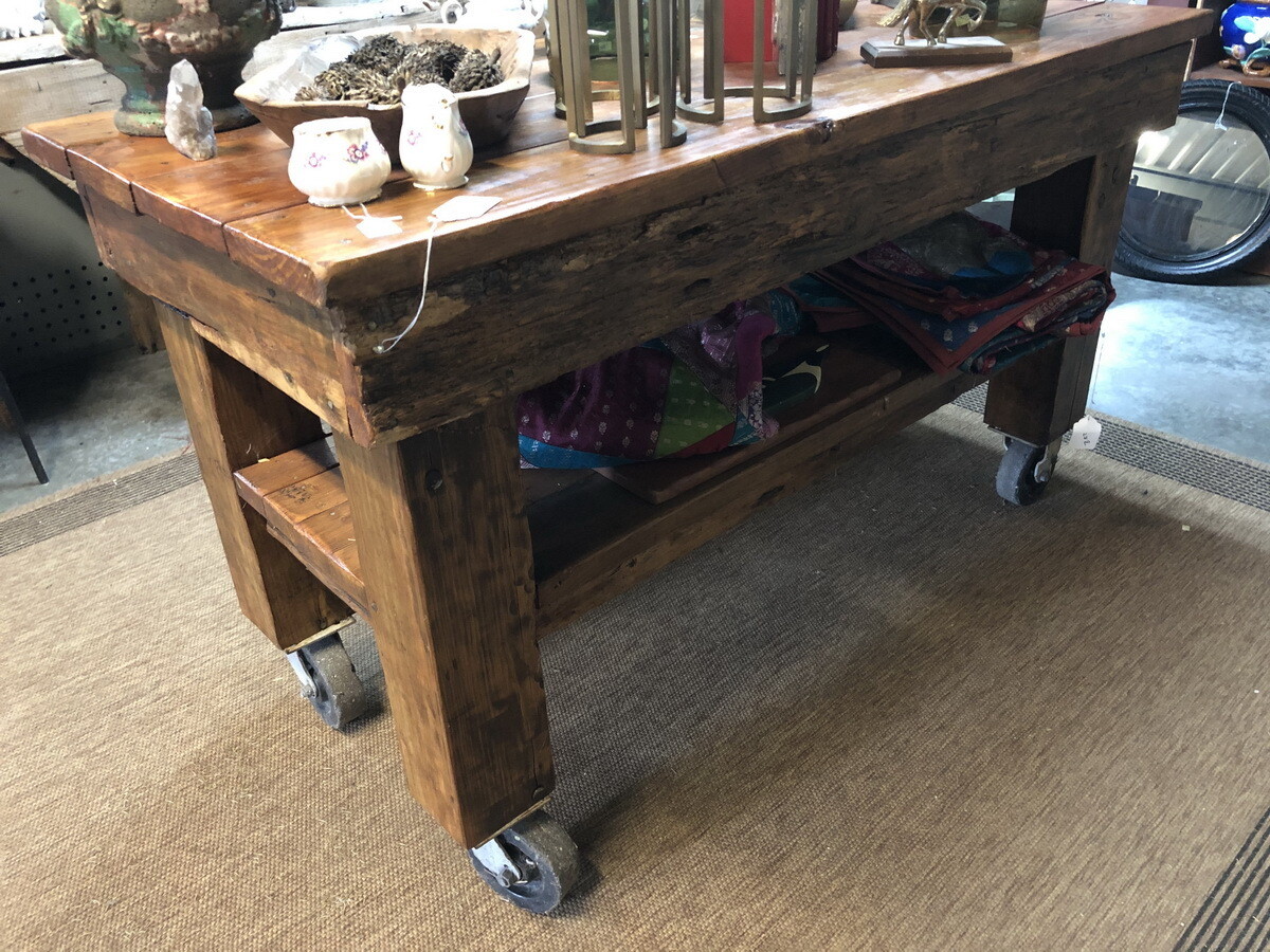 SOLID WOOD ISLAND ON LARGE CASTERS WITH FULL WIDTH SHELF Store is