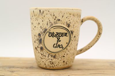Modderregen Blanco - Mok Logo