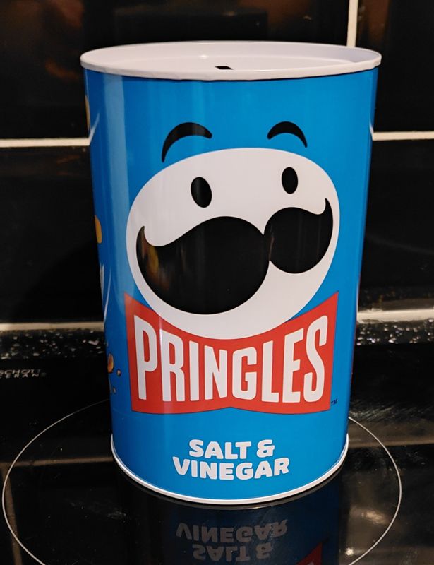 Blue pringle tin the type you cut open with a tin opener 15cm high 10cm width