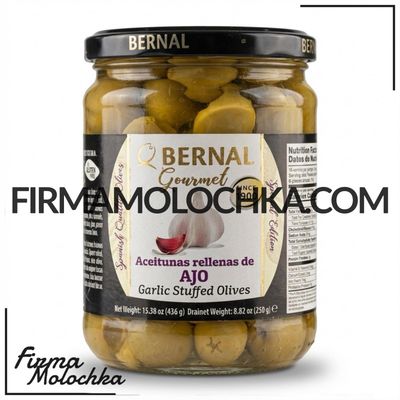 Оливки зелені фаршировані ПАСТОЮ З ЧАСНИКА (скло) 436/250грам ТМ Бернал (12шт/ящ)