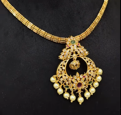 Jigini with detachable locket