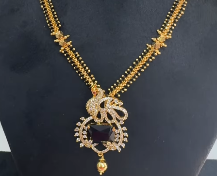 Black beads with removable locket