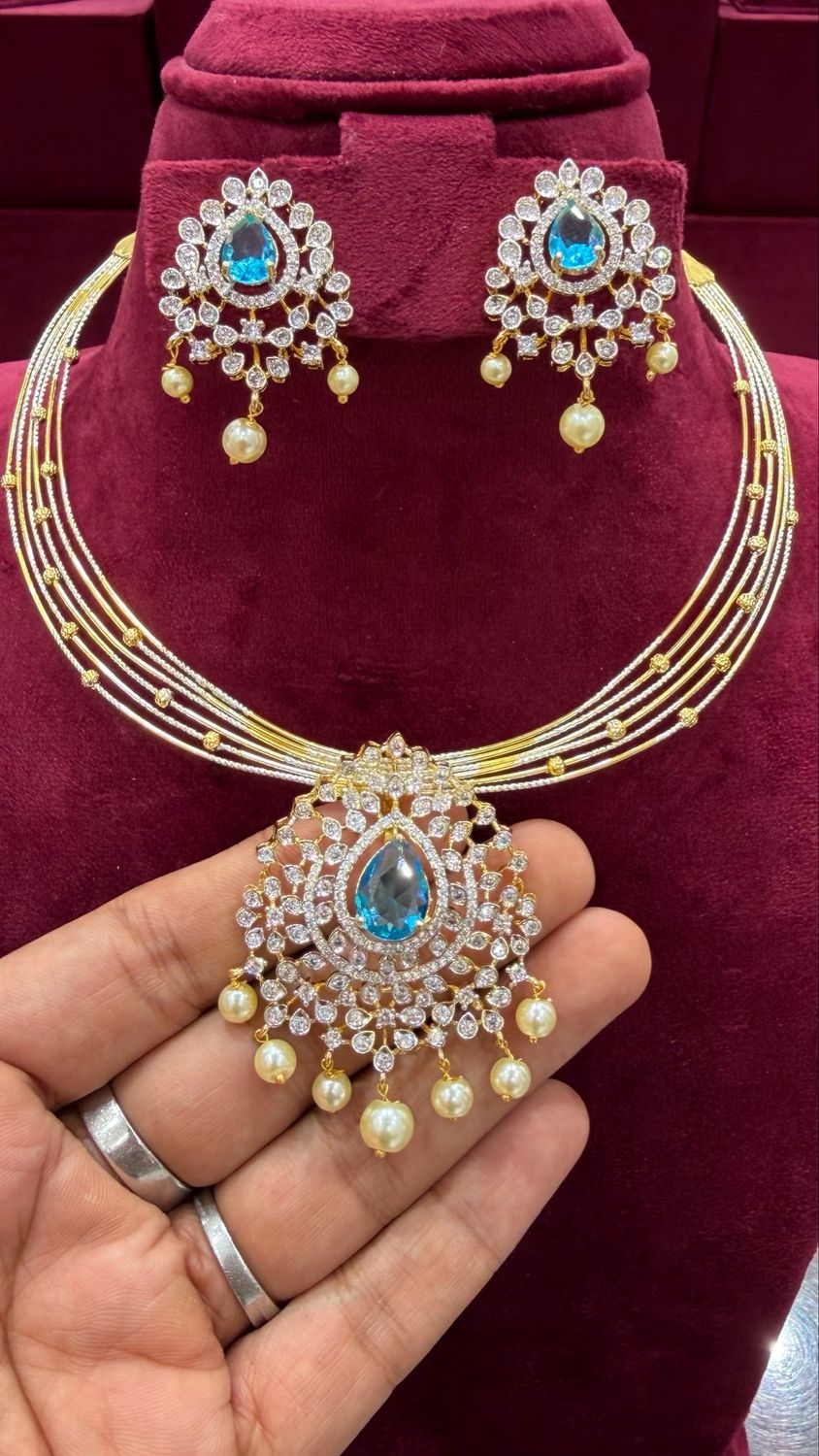 Hasli With Aqua Blue Stone Locket Set