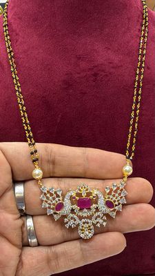 Black Diamonds Set With Diamond Locket
