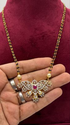 Black Diamonds Set With Diamond Locket