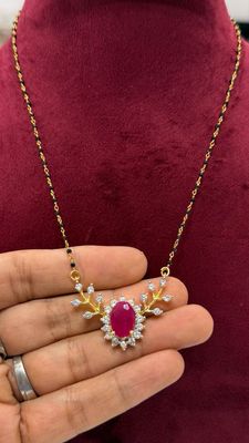 Black Diamonds Set With Diamond Locket