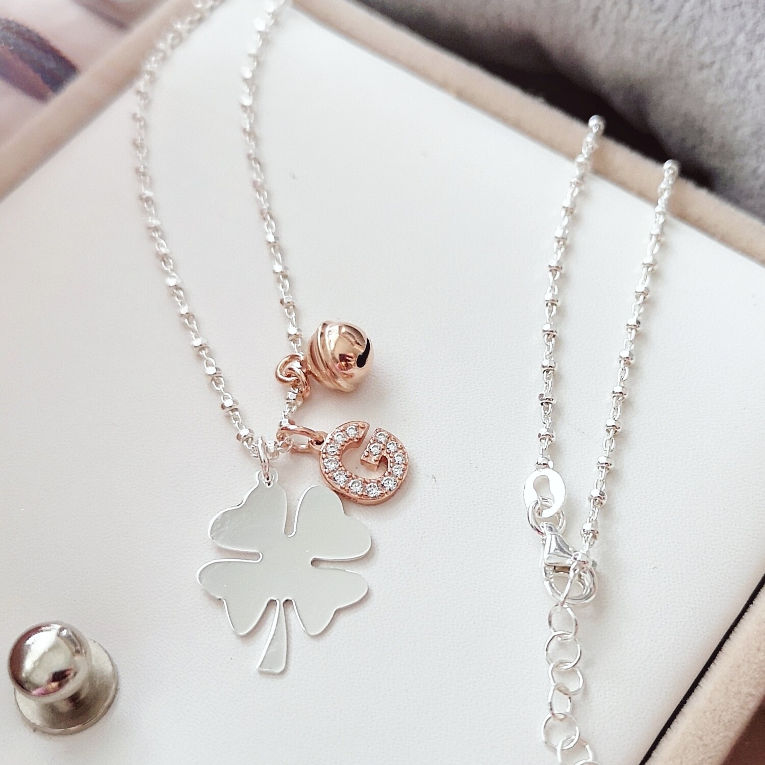 COLLANA MICROSFERE E QUADRIFOGLIO 