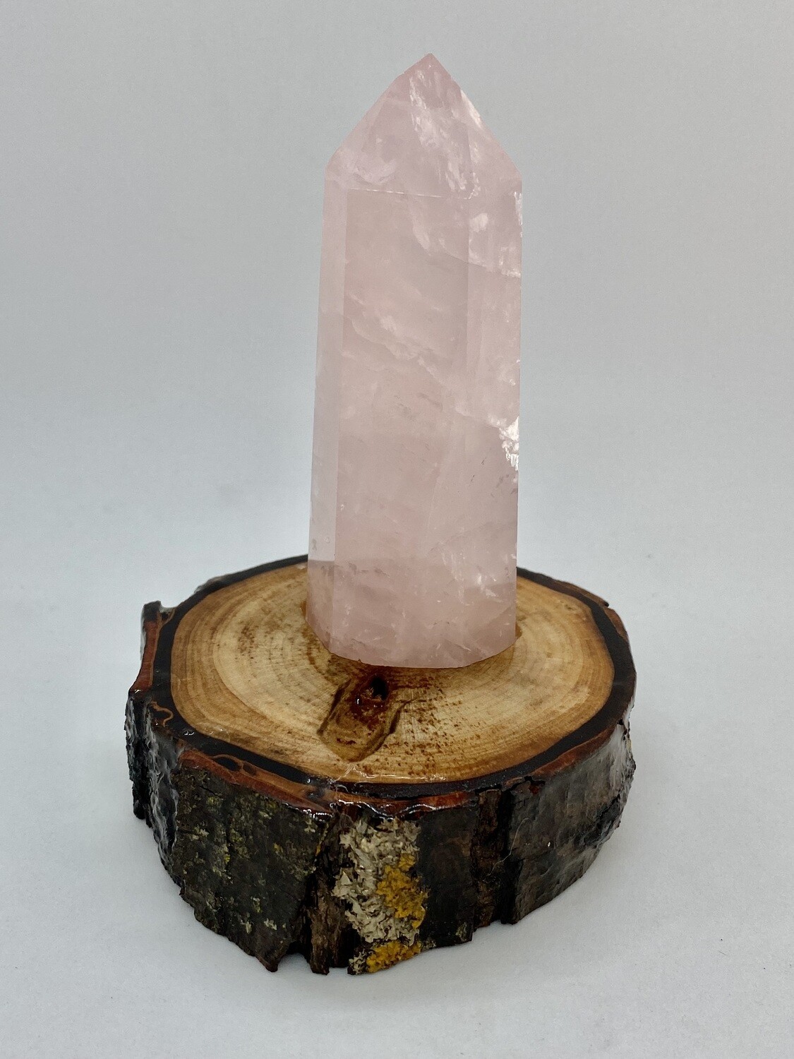 Rose Quartz Tower on a Wooden Stand