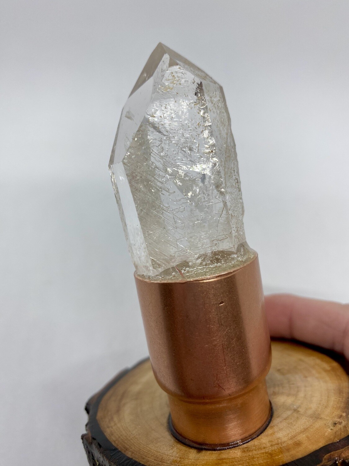 Starbrary Etched Quartz Point in Copper on a Wooden Stand