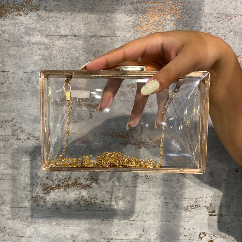 CARTERA DE MANO O CRUZADA - DORADA / TRANSPARENTE