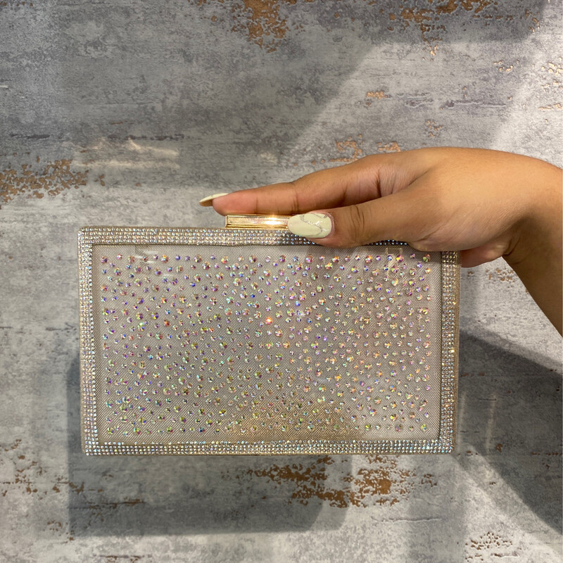 CARTERA DE MANO O CRUZADA - DORADA