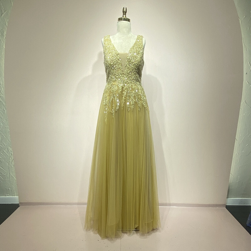 Vestido largo corte A, color amarillo mostaza pálido. Talla S