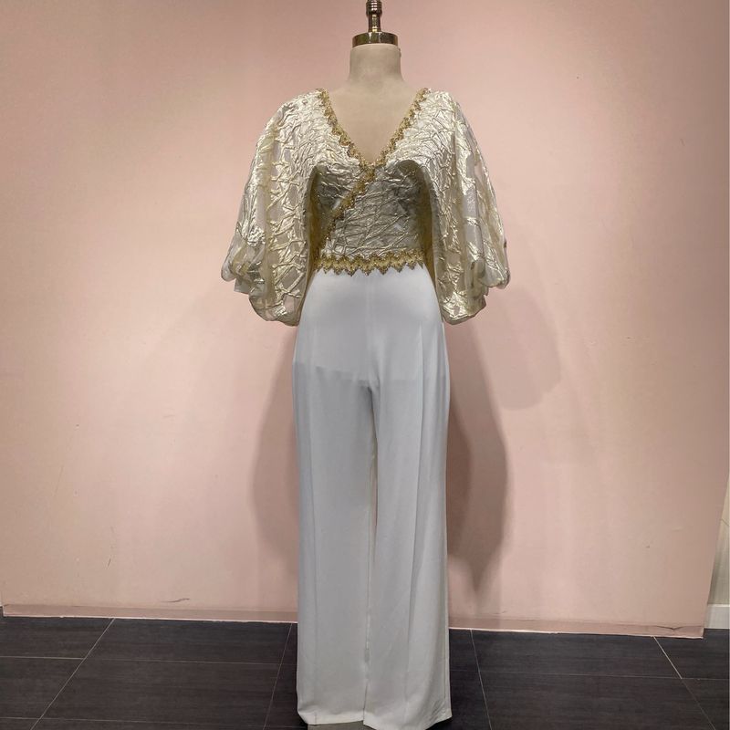 Jumpsuit Blanco y dorado talla:42