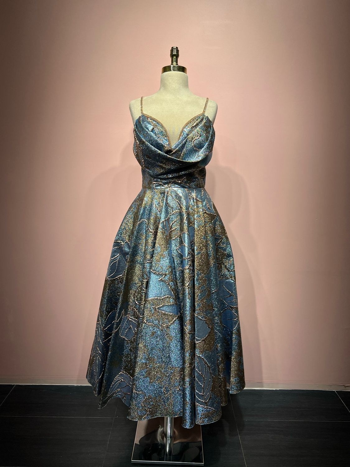 light blue with gold,	midi dress.