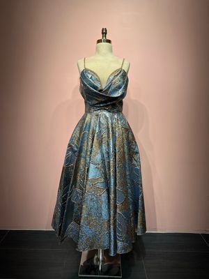 light blue with gold,	midi dress.