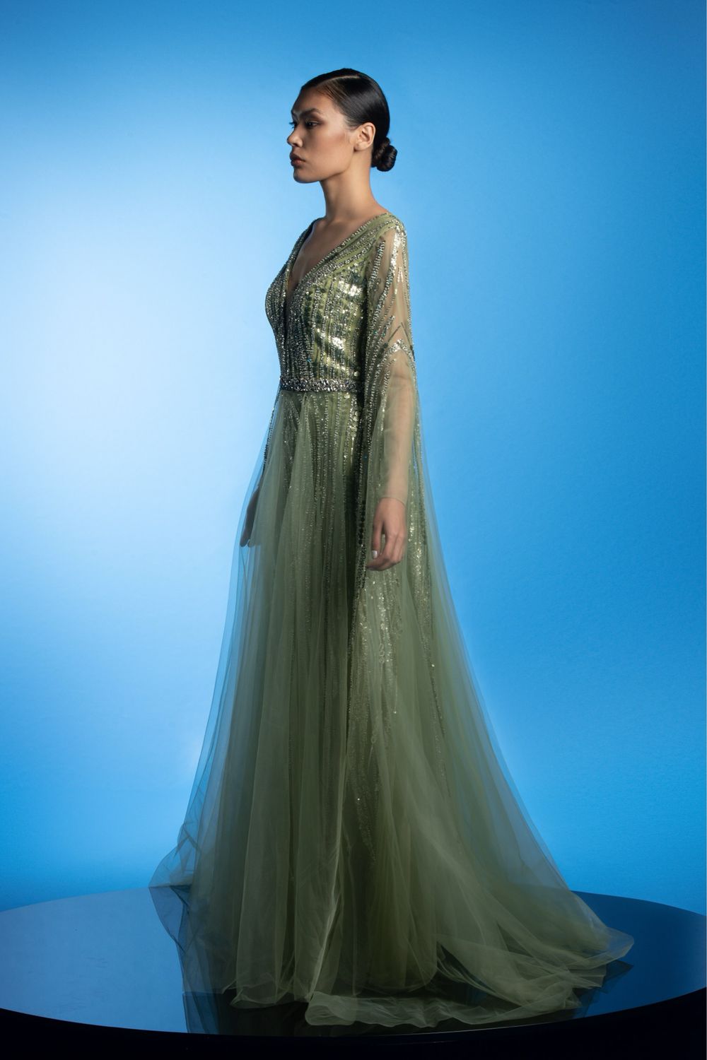 Long dress in	Olive green, size 46
