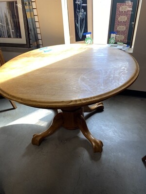CLEAARANCE LG. RD. DINING TABLE