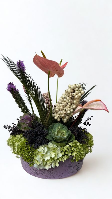 Arreglo redondo con anturios