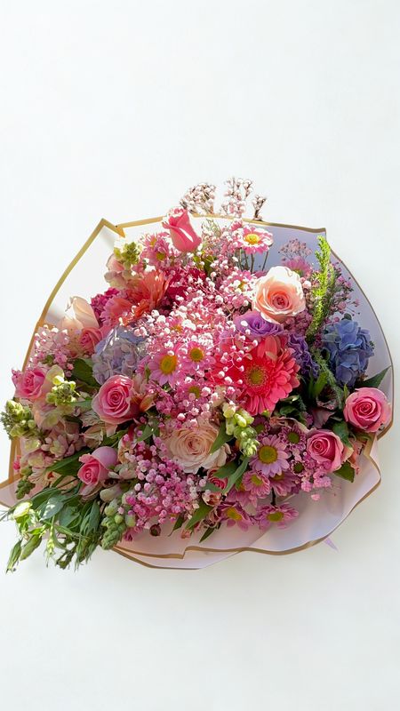 Ramillete grande en tonos rosa