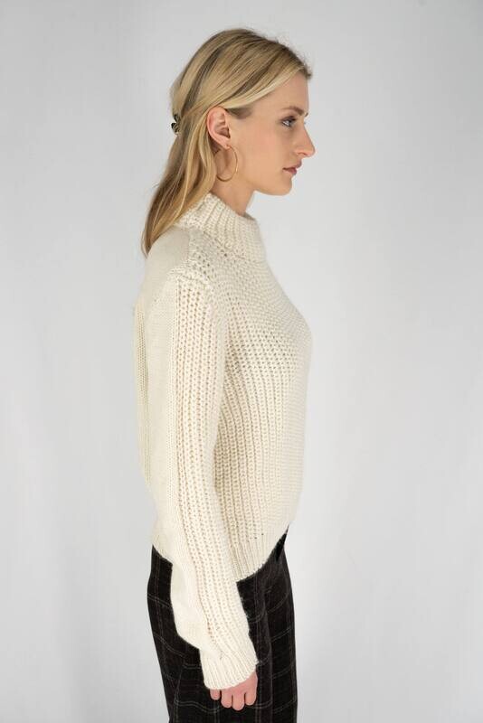 Pull devant perle