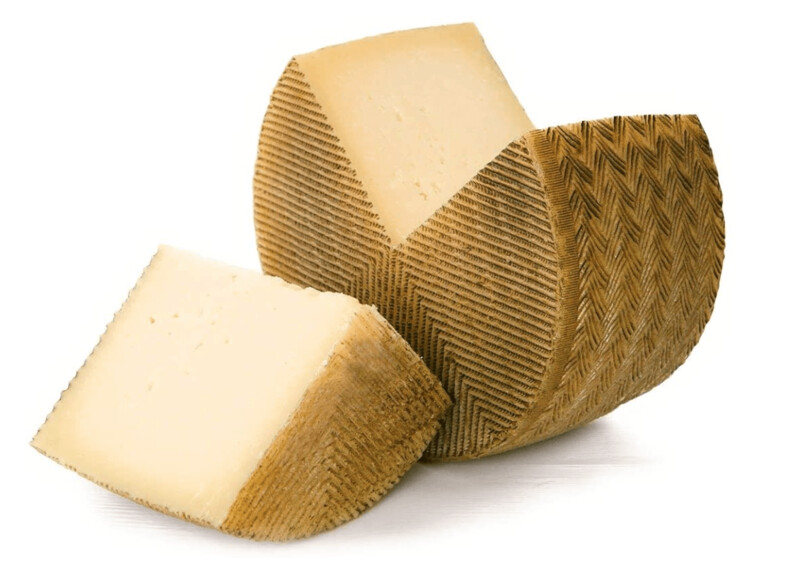1/2 QUESO CURADO DE OVEJA VIEJO ARTESANO " QUEJARA" Textura compacta Sabor intenso y agradable retro-gusto.