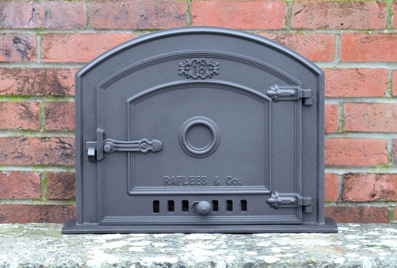 Porte de four en fonte