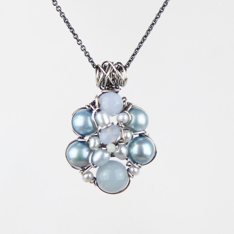 Blå kulturperler, blå agat, blonde agat og sterlingsølv.