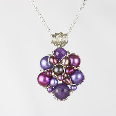 Lilla kulturperler med en ametyst og sterlingsølv.