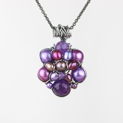 Lilla kulturperler med en ametyst og sterlingsølv.