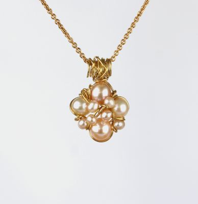 Forgyldt sølv og rosa kulturperler