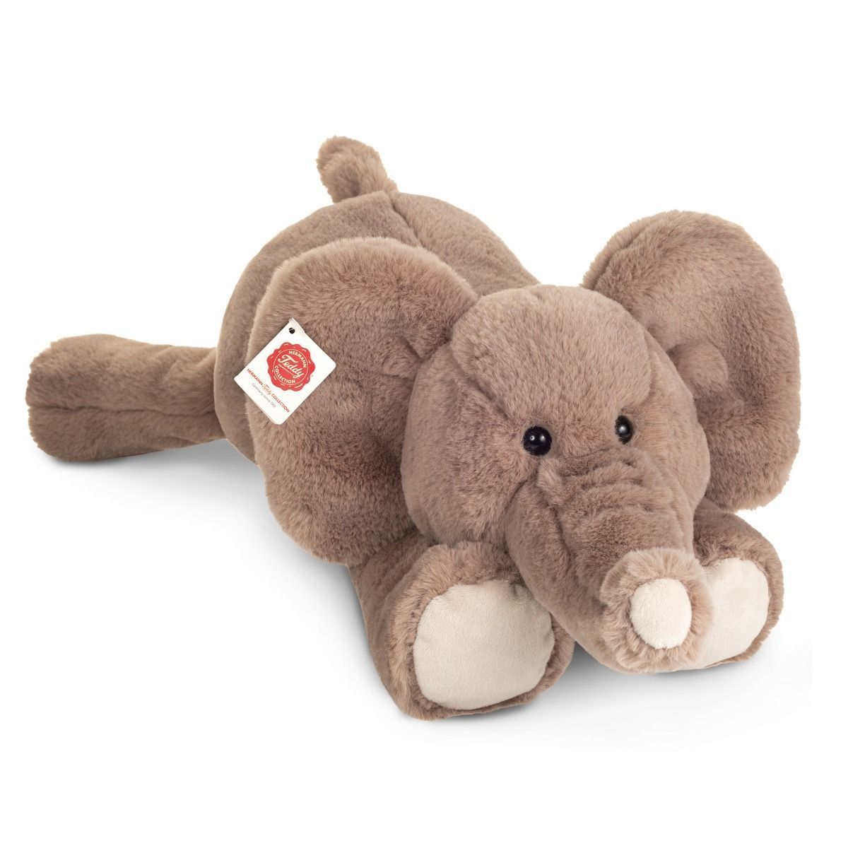 Elefant Lorenzo - Hermann Teddy Hermann Teddy Elefant Lorenzo sitzend aus samtweichem grauem Plüsch mit großen Schlappohren und geschwungenem Rüssel