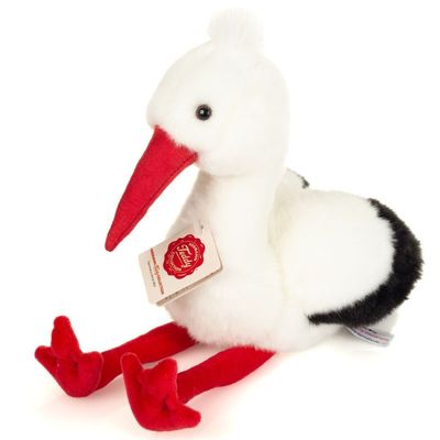 Vogel Storch - Hermann Teddy Hermann Teddy Storch stehend mit weißem Plüschgefieder, schwarzen Flügelspitzen und langem rotem Schnabel und Beinen