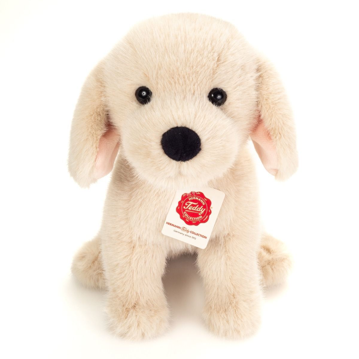 Hund Welpe Barry - Hermann Teddy Hermann Teddy Hund Welpe Barry sitzend aus hellbraunen weichem Plüsch mit Schlappohren und treuen Augen