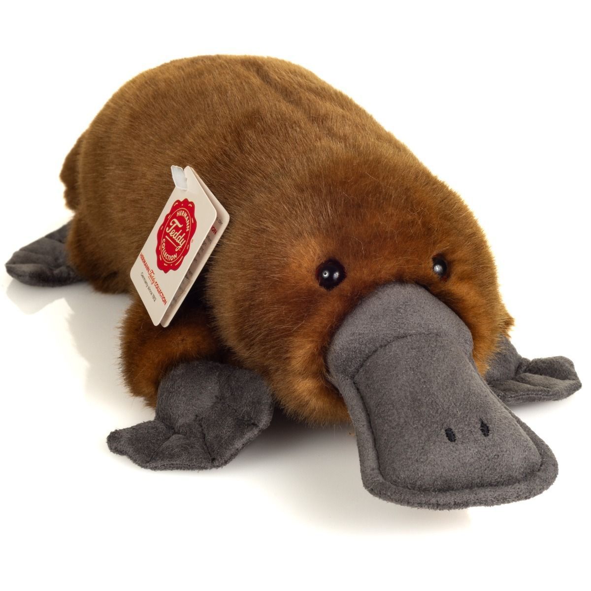 Schnabeltier - Hermann Teddy Hermann Teddy Schnabeltier liegend aus braunem samtweichem Plüsch mit Schnabel und flachem Schwanz