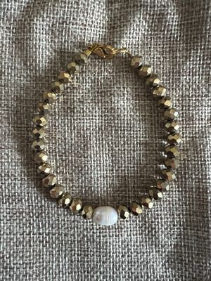 Bracelet perles facettées dorées