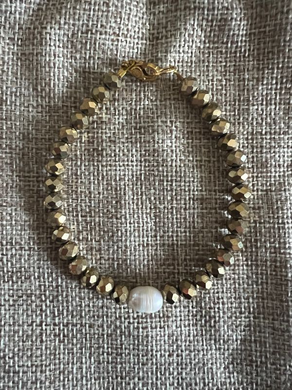 Bracelet perles facettées dorées