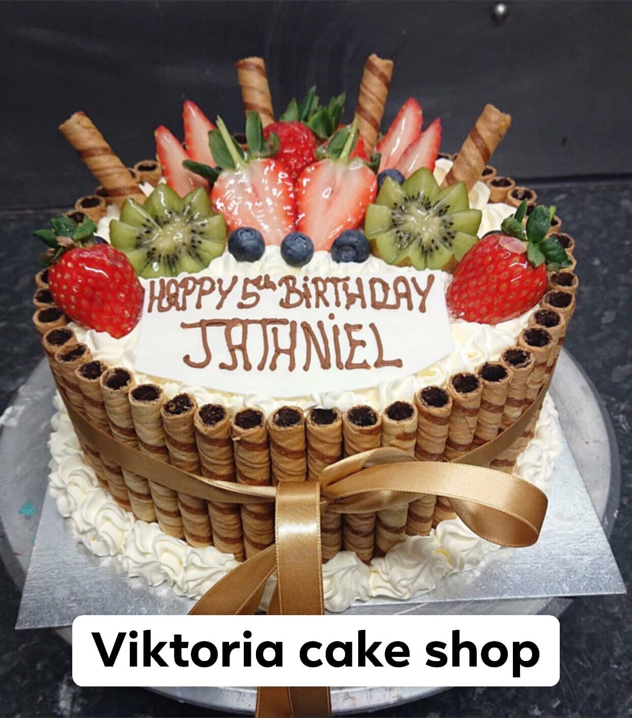 Fresh Cream cake with chocolate Waffle topped with fruits