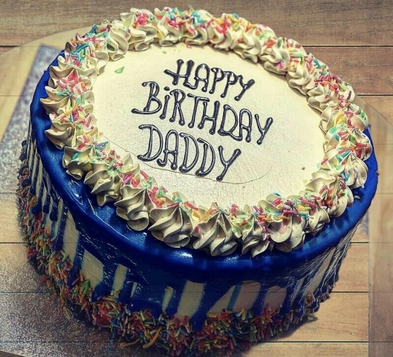 Fresh Cream Cake  with Melted Blue  Chocolate and  Rainbow Sprinkles