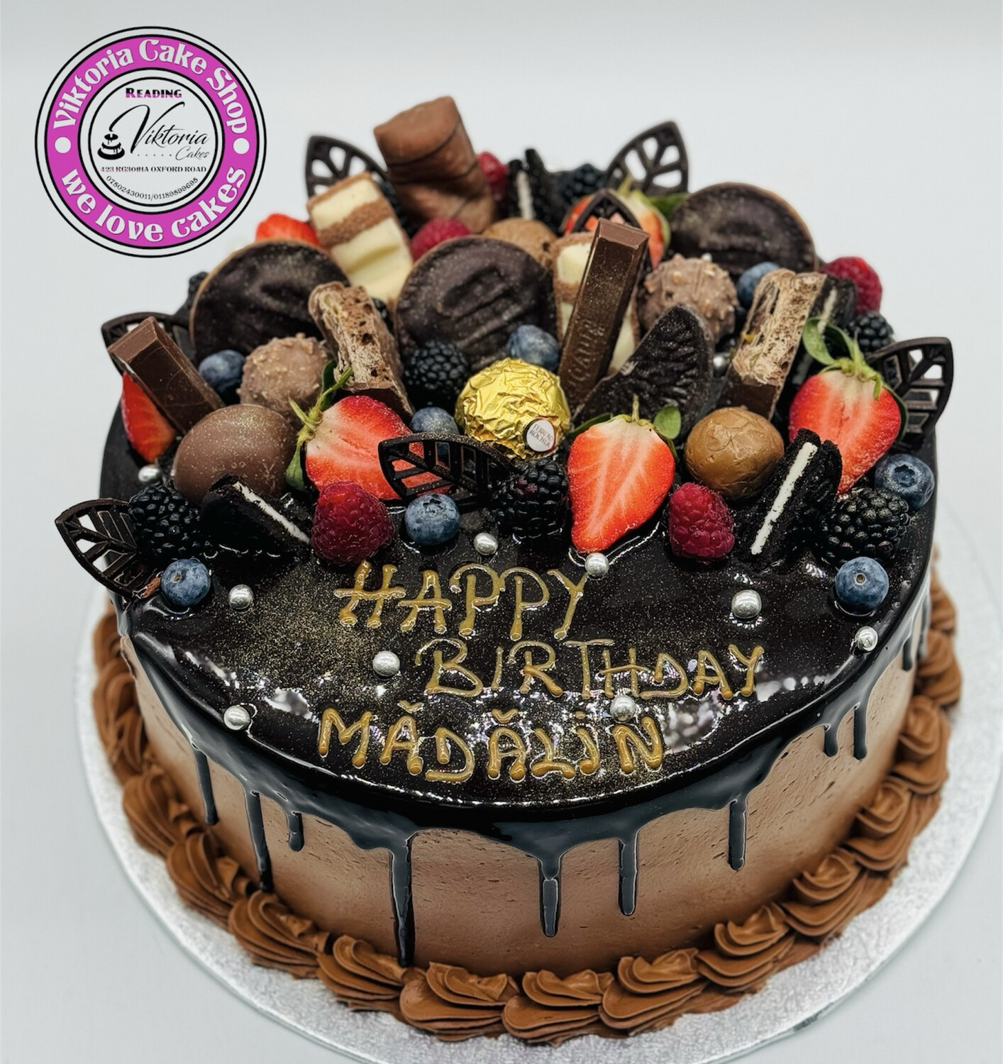 Cake With Dark Melted  Chocolate Fruits and Chocolate Pieces