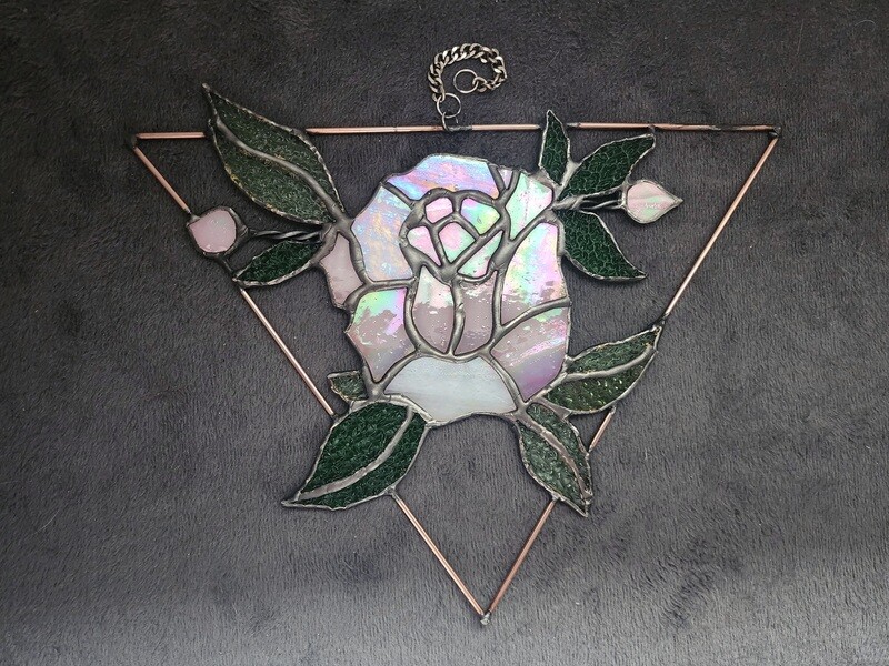 Stained glass rose in geometric frame