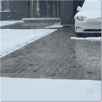 Say Goodbye to Shoveling With Our Heated Paver Driveways and Walkways!