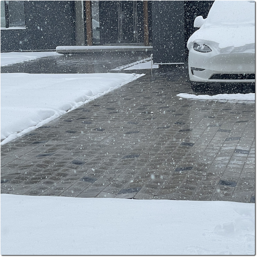 Say Goodbye to Shoveling With Our Heated Paver Driveways and Walkways!