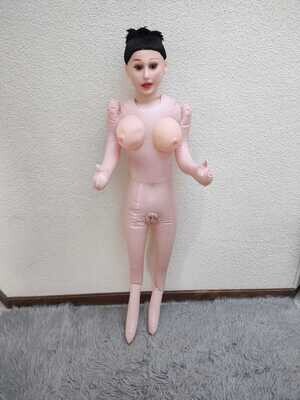 MUÑECA INFLABLE CON VELLO