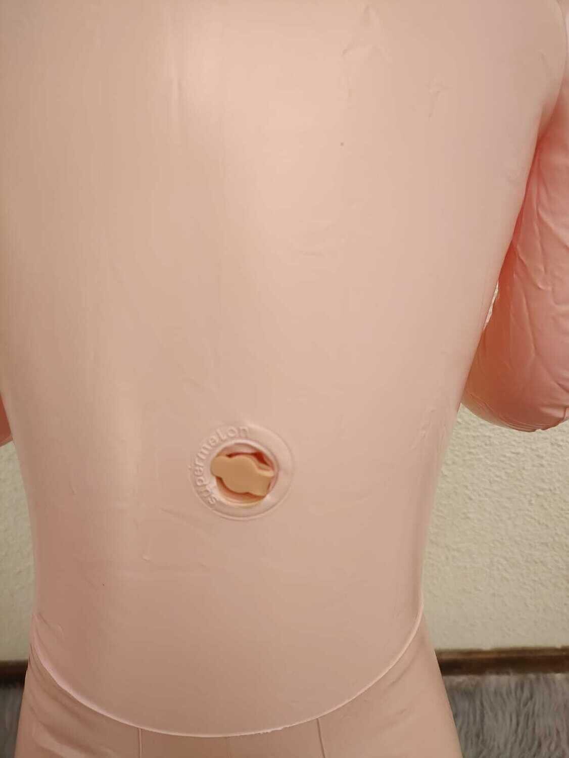 MUÑECA INFLABLE CON VELLO