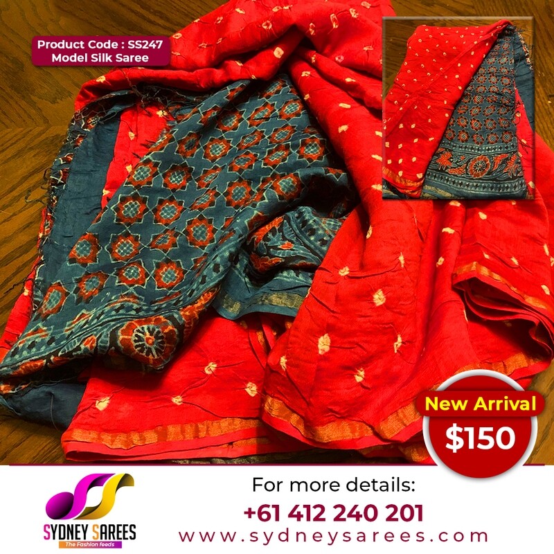 A Model silk with Bhandej print on the body and Ajrakh pattern on the pallu and blouse piece.