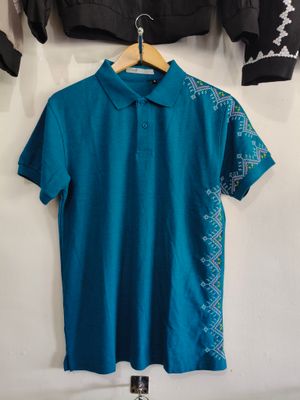 Polo. TBOLI HAND- EMBROIDERED POLO