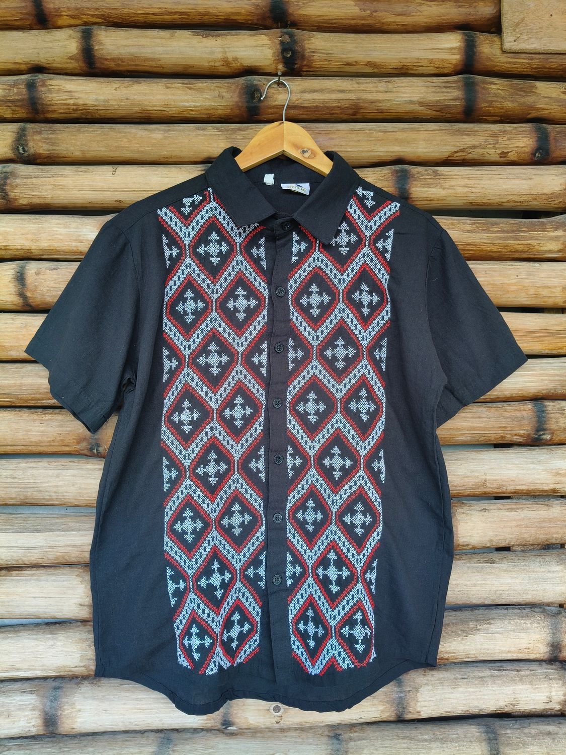 Polo. TBOLI HAND- EMBROIDERED POLO