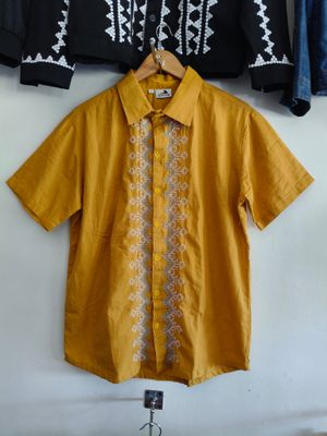 Polo. TBOLI HAND- EMBROIDERED POLO