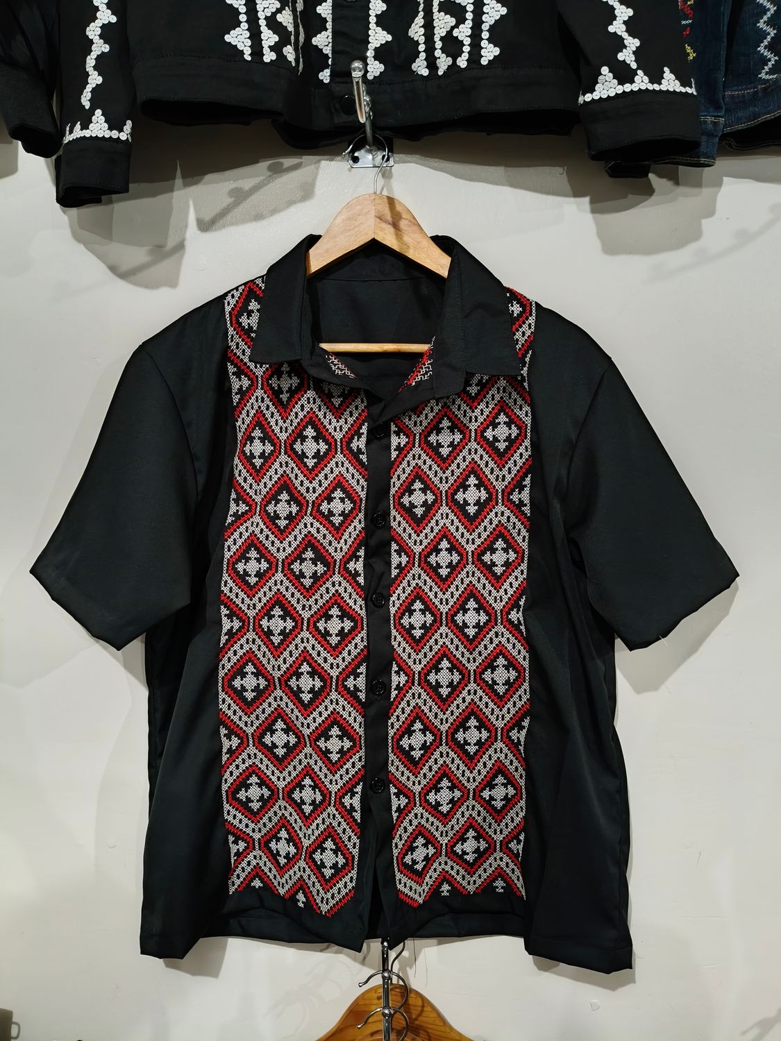 Polo. TBOLI HAND- EMBROIDERED POLO